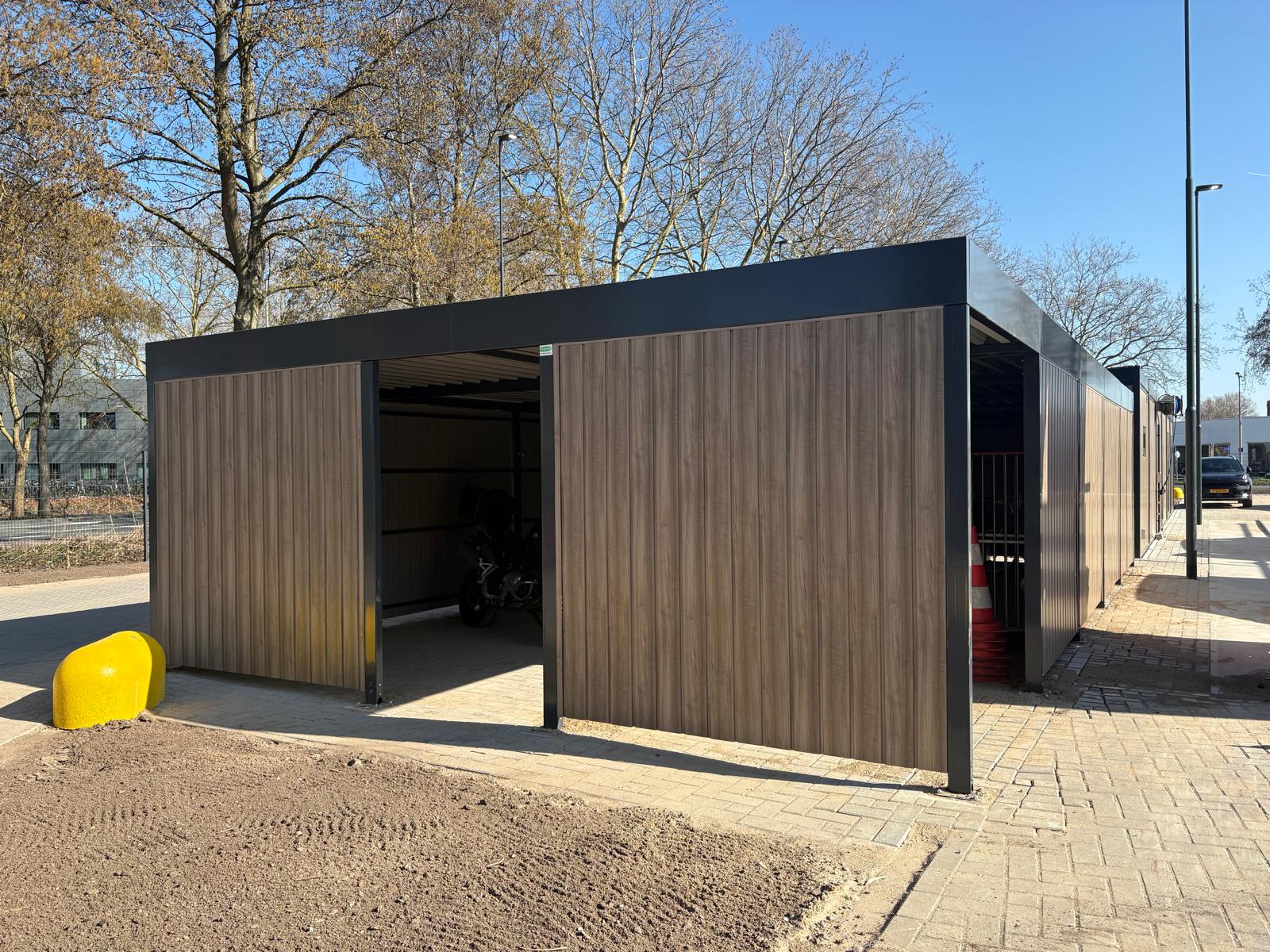 CuBic fietsoverkapping en Cobra fietsenrekken Klaver Fietsparkeren