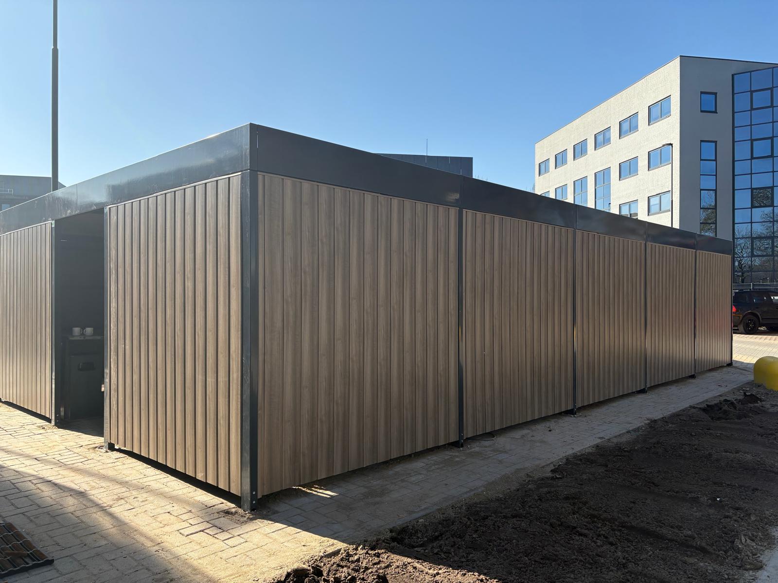 CuBic fietsoverkapping en Cobra fietsenrekken Klaver Fietsparkeren